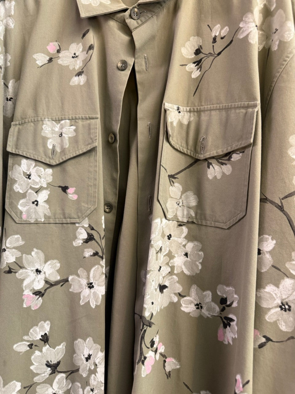 BERLIN VINTAGE CORNER olive green military style overshirt with hand-painted white and pink cherry blossoms on back and sleeves.
