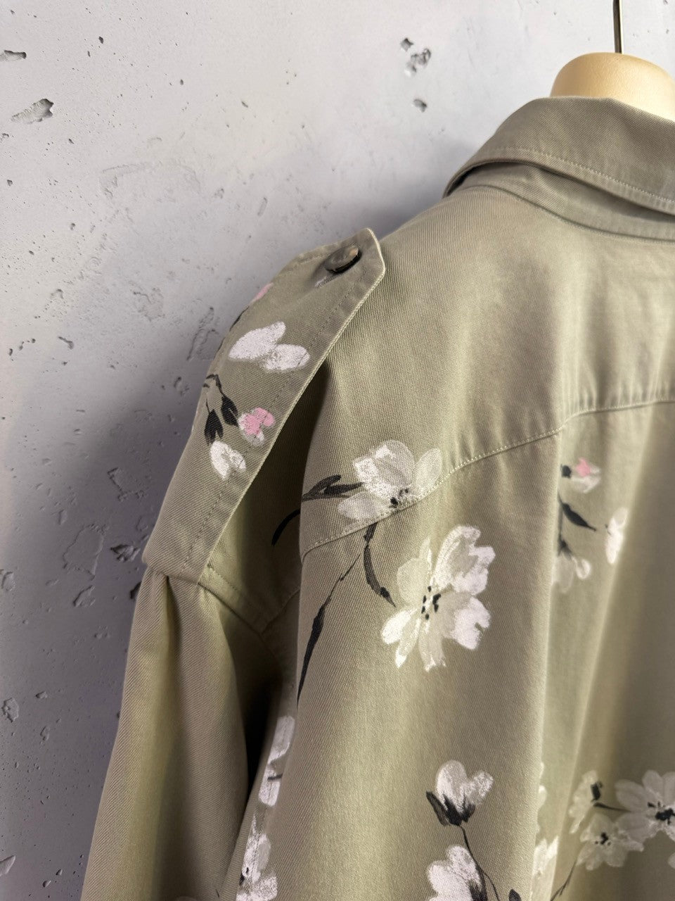 BERLIN VINTAGE CORNER olive green military style overshirt with hand-painted floral print on back and sleeves.