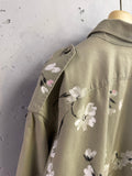 BERLIN VINTAGE CORNER olive green military style overshirt with hand-painted floral print on back and sleeves.