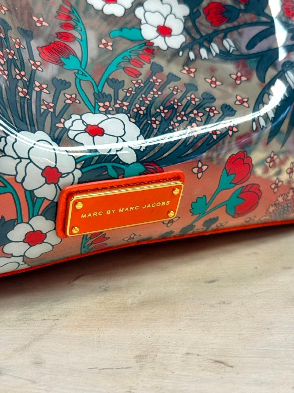 BERLIN VINTAGE CORNER transparent PVC Marc by Marc Jacobs tote with red, teal, and white floral print and orange trim