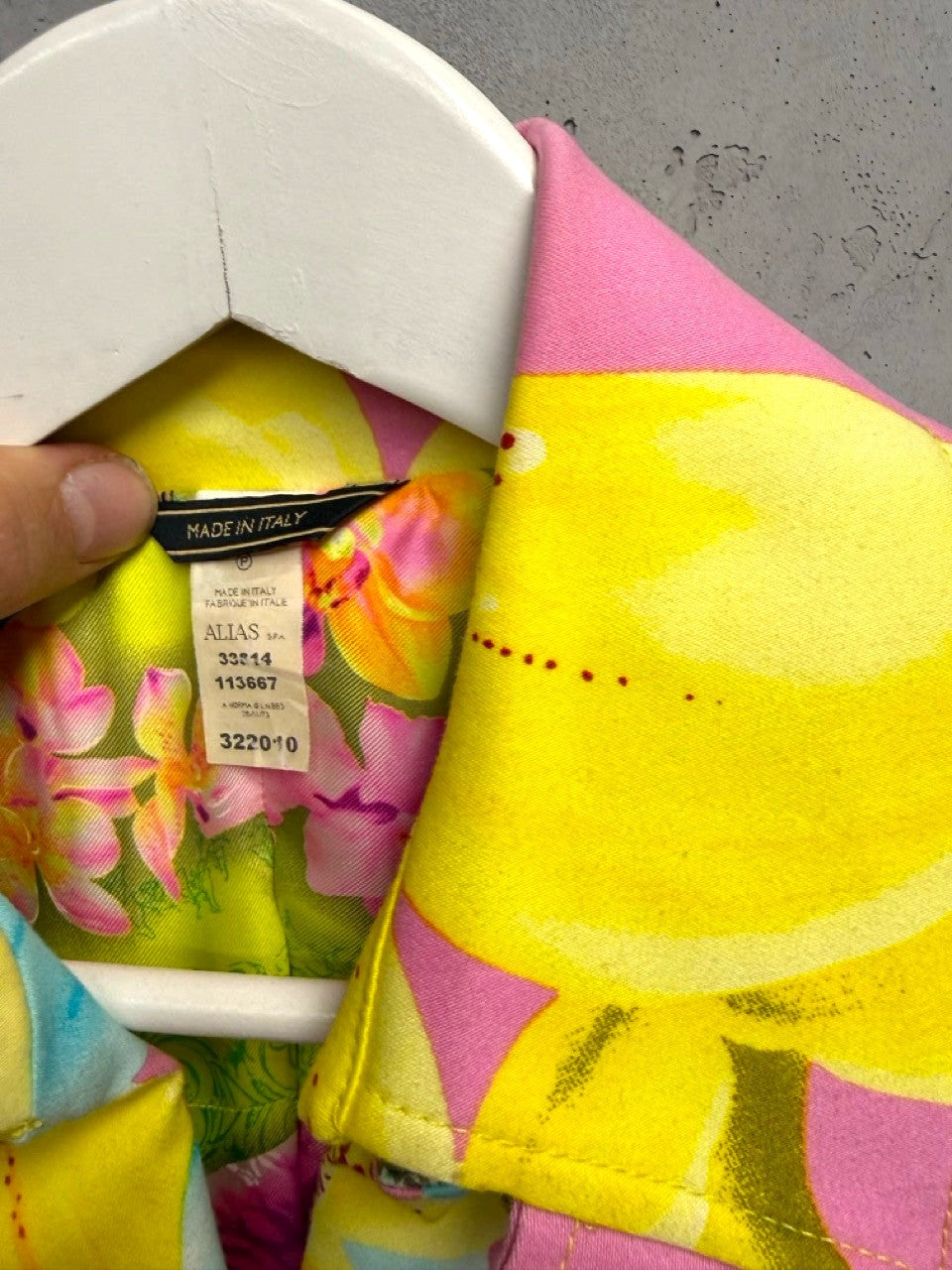 BERLIN VINTAGE CORNER yellow, pink, blue floral print double-breasted trench coat with gold buttons and belt.