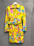 BERLIN VINTAGE CORNER yellow, pink, and blue floral print double-breasted trench coat with belt and gold buttons.