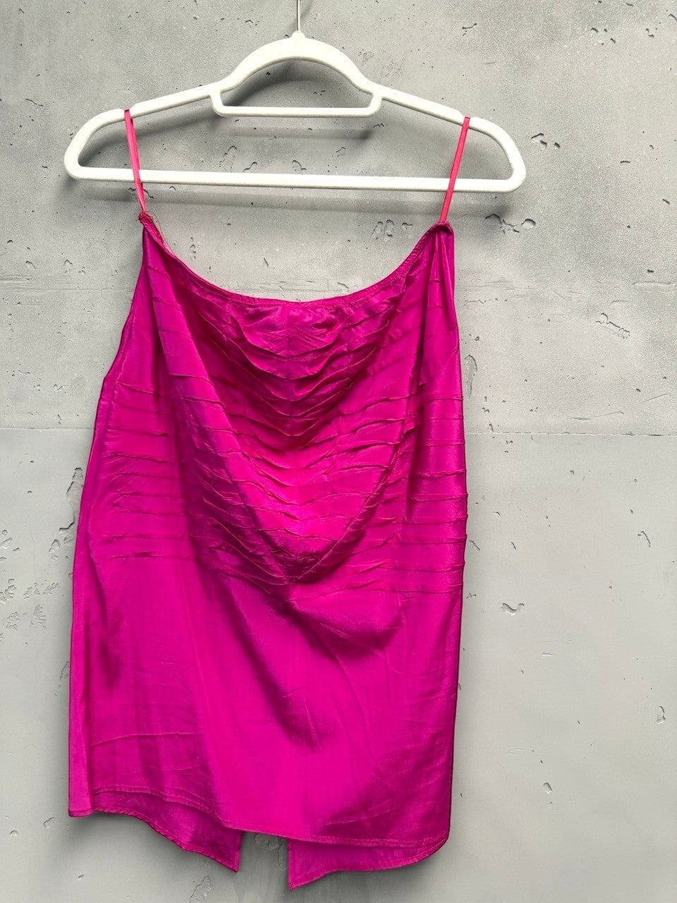 BERLIN VINTAGE CORNER fuchsia ruched silk spaghetti strap top with adjustable straps and a draped hem.