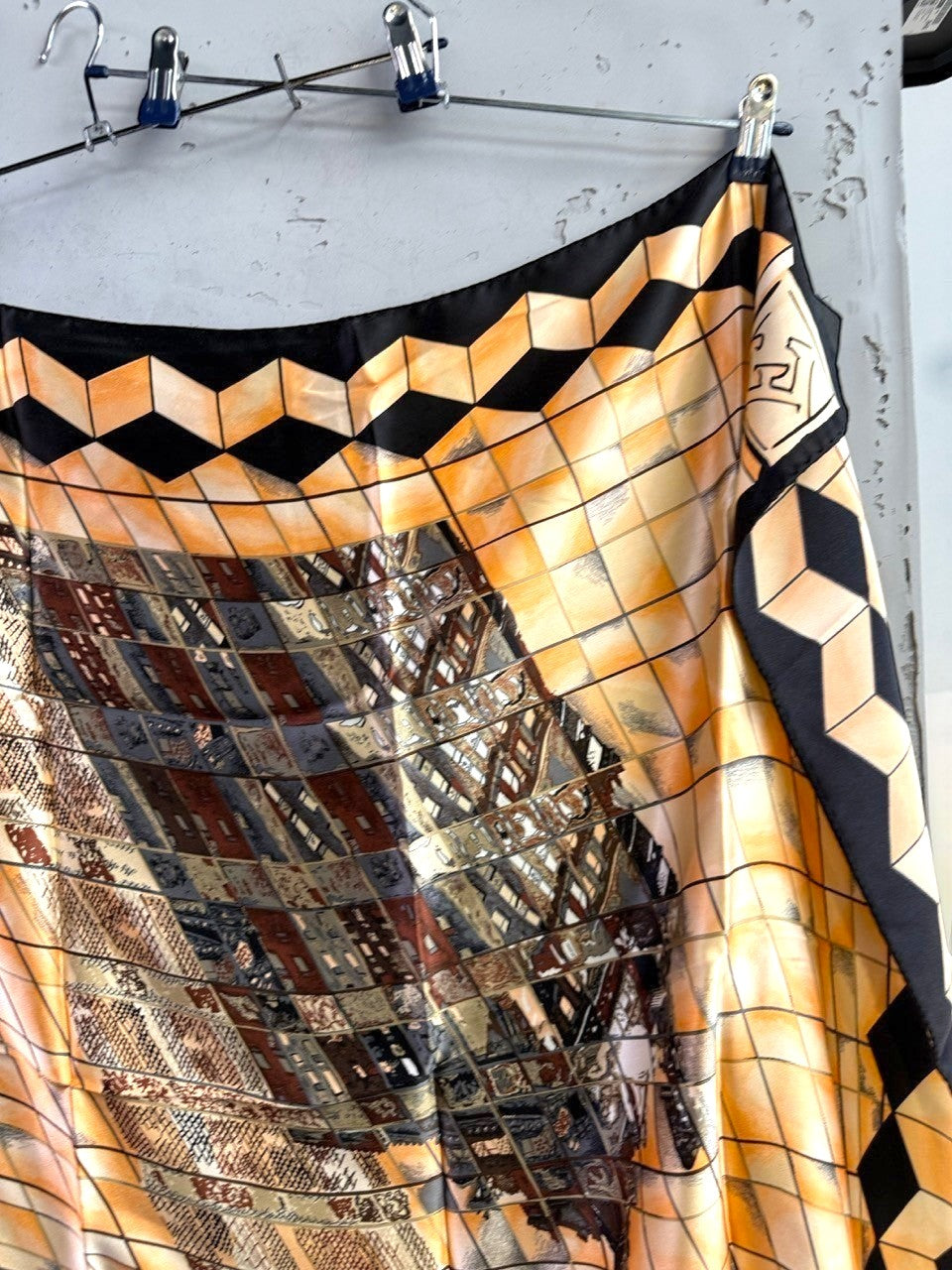 BERLIN VINTAGE CORNER silk scarf with geometric architectural print in peach, black, and earth tones.