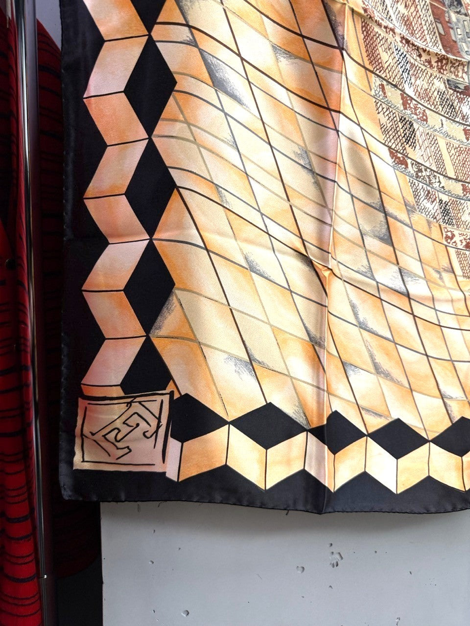 BERLIN VINTAGE CORNER silk scarf with peach and black geometric 3D cube pattern and structured border.