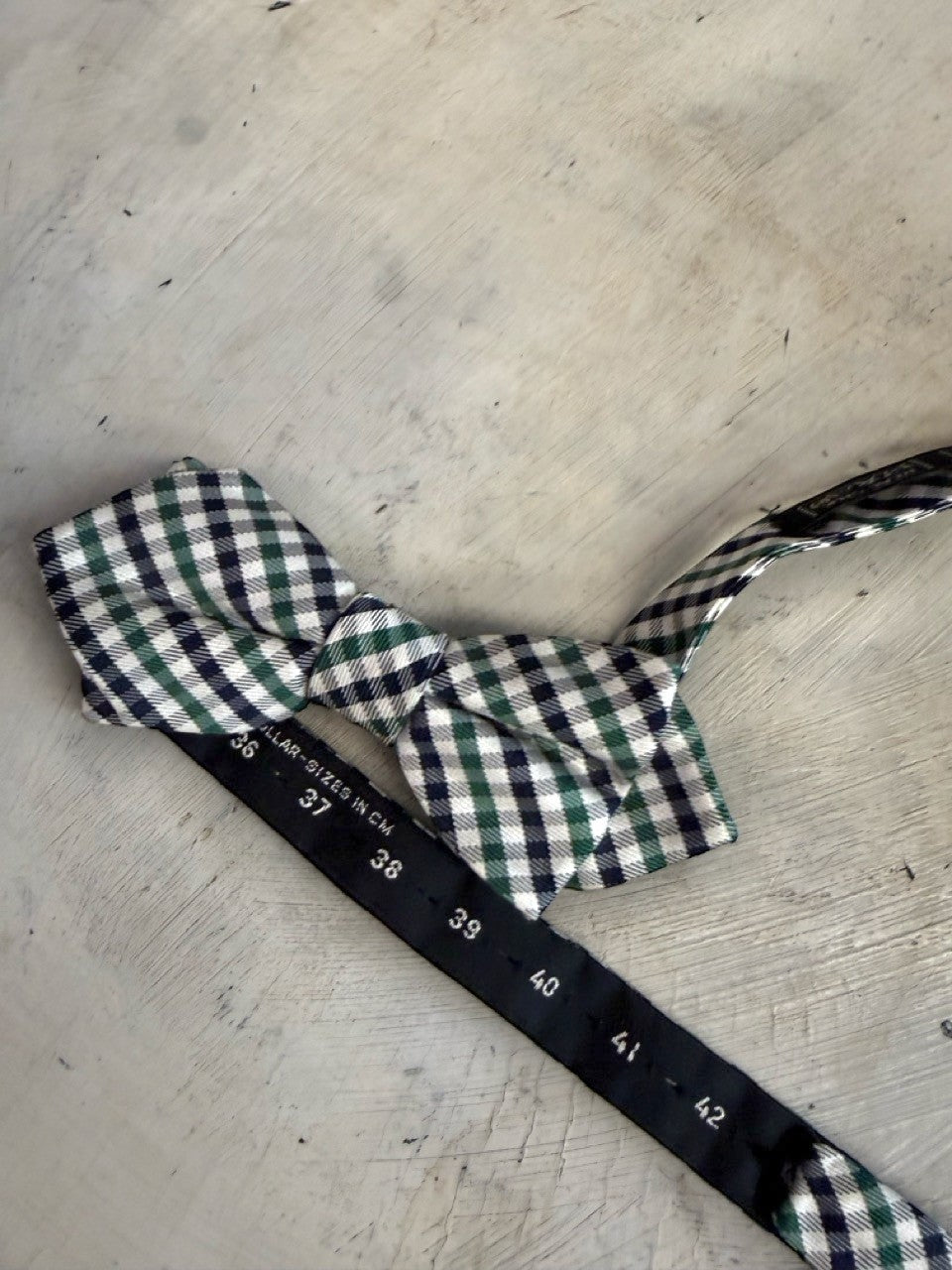 BERLIN VINTAGE CORNER navy, forest green, and white gingham bow tie with adjustable strap.