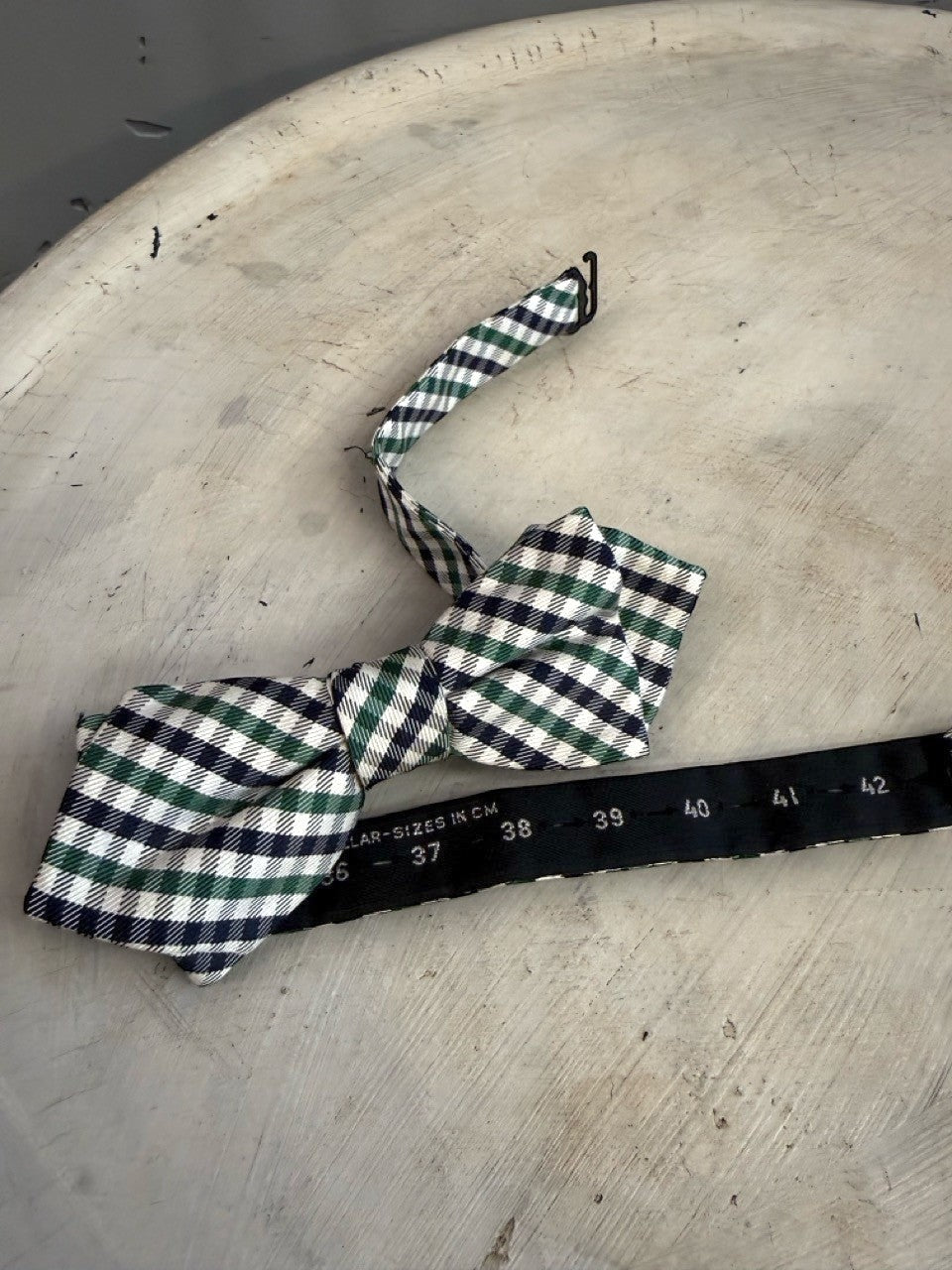 BERLIN VINTAGE CORNER navy, forest green, and white gingham bow tie with adjustable strap.
