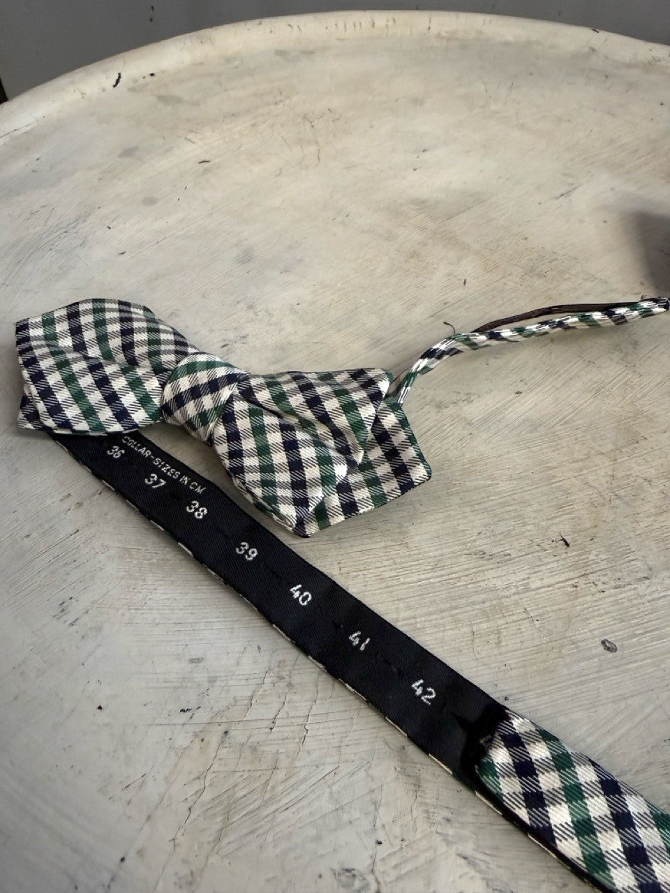 BERLIN VINTAGE CORNER navy, forest green, and white gingham pre-tied bow tie with adjustable strap.