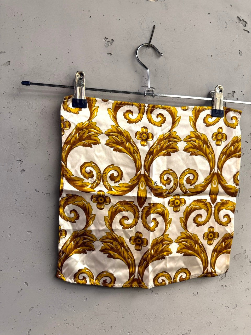 BERLIN VINTAGE CORNER silk pocket square in cream with a gold baroque acanthus leaf and floral print.