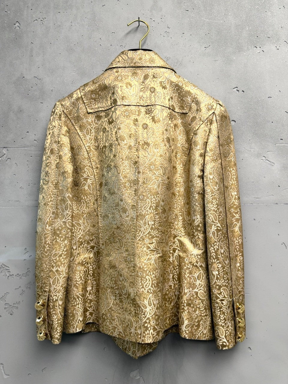 BERLIN VINTAGE CORNER gold brocade paisley jacket with ornate buttons and puff sleeves.