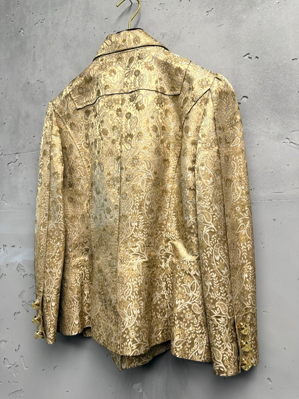 BERLIN VINTAGE CORNER gold brocade paisley jacket with ornate gold buttons and puff sleeves.
