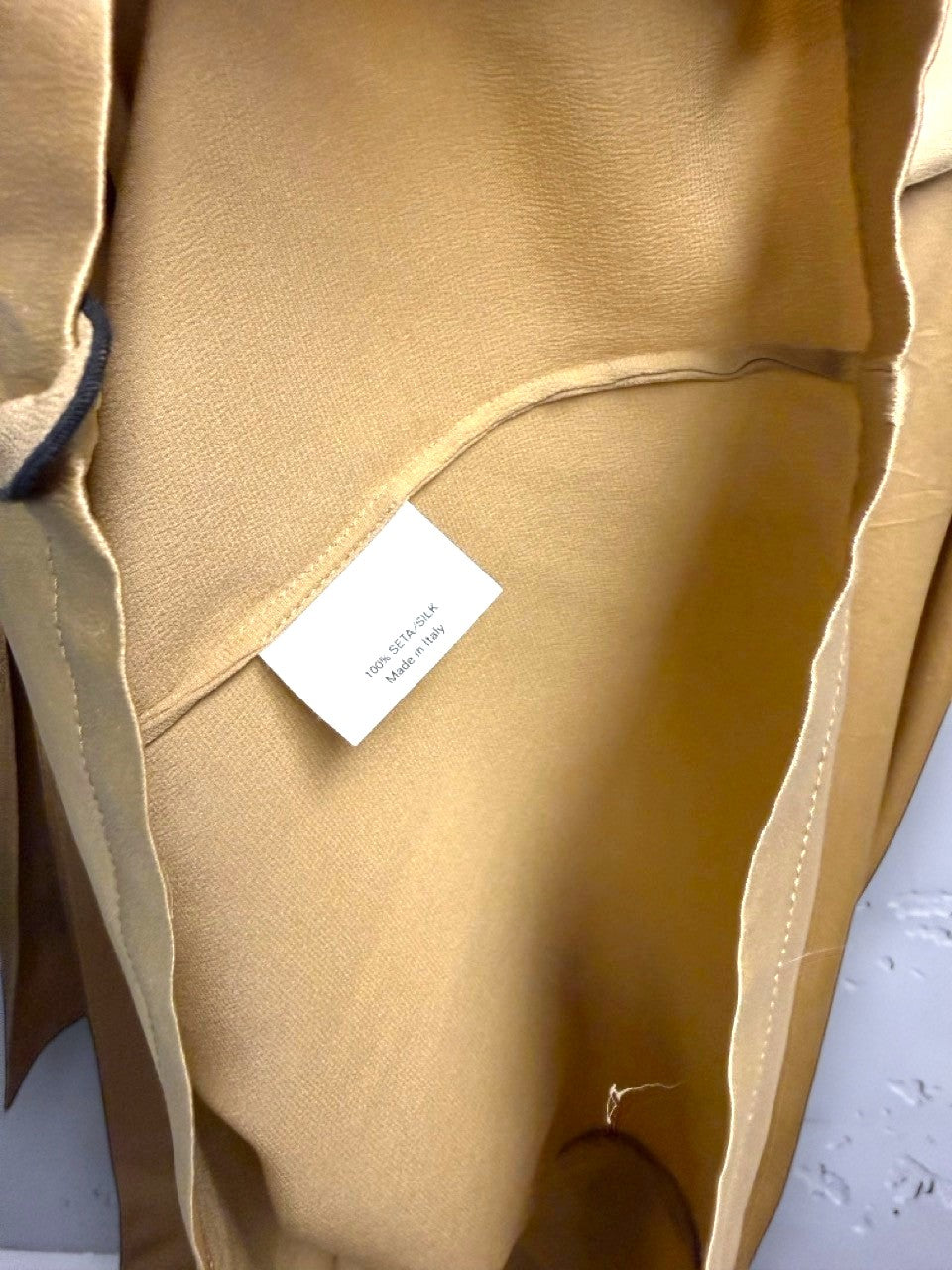 BERLIN VINTAGE CORNER gold silk midi dress with V-neck and ruffle trim.
