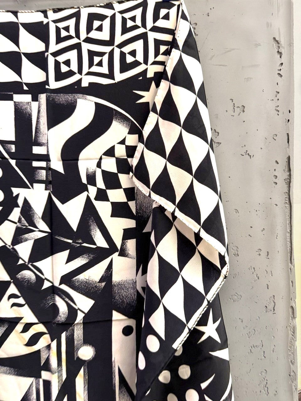 BERLIN VINTAGE CORNER black and white silk scarf with geometric, polka dot, and abstract avant-garde patterns.