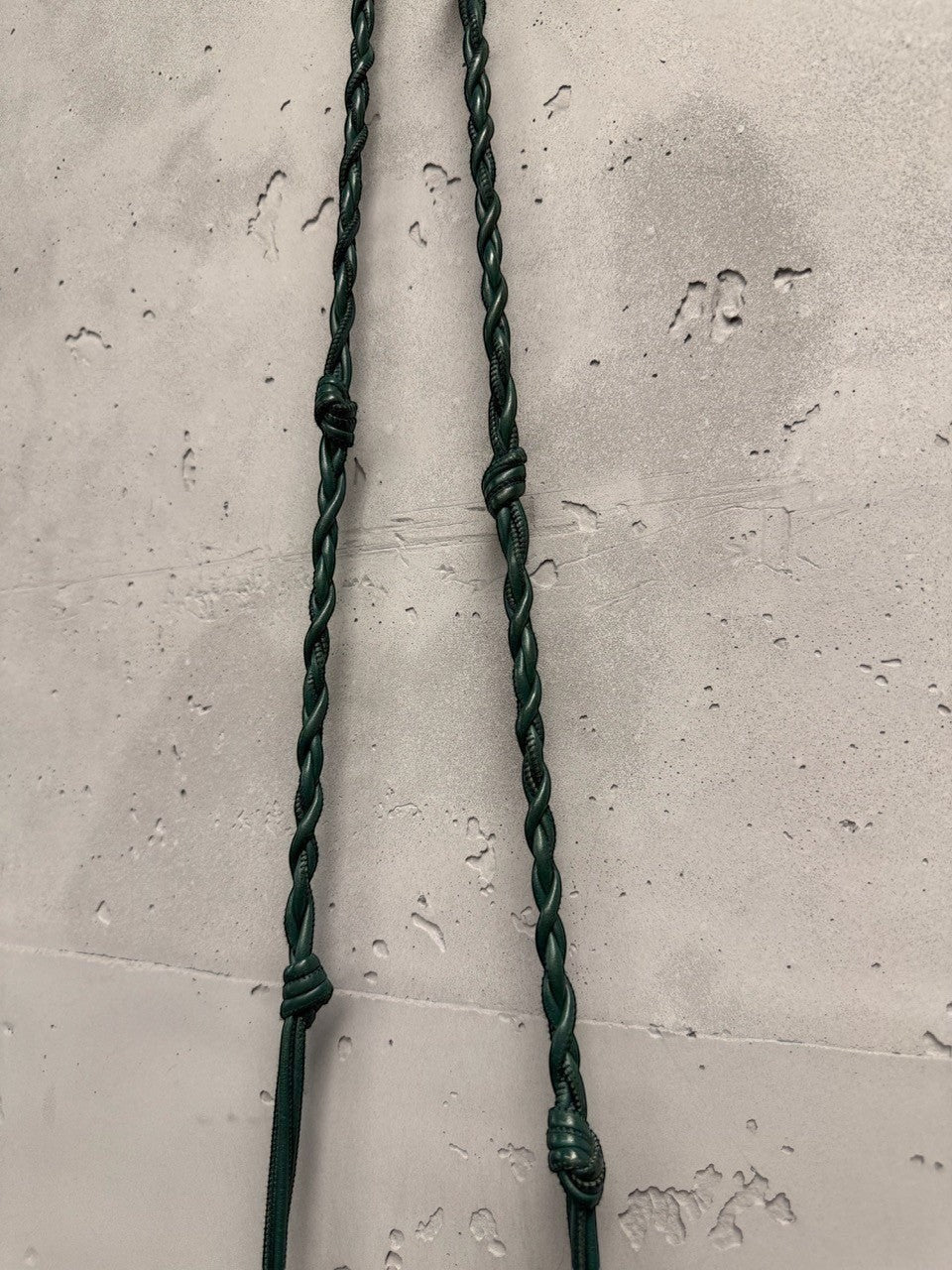 BERLIN VINTAGE CORNER forest green leather crossbody bag with braided adjustable strap and knots