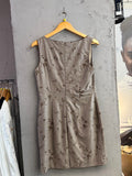 BERLIN VINTAGE CORNER grey sleeveless sheath dress with brown floral embroidery, V-neckline, and tailored silhouette.
