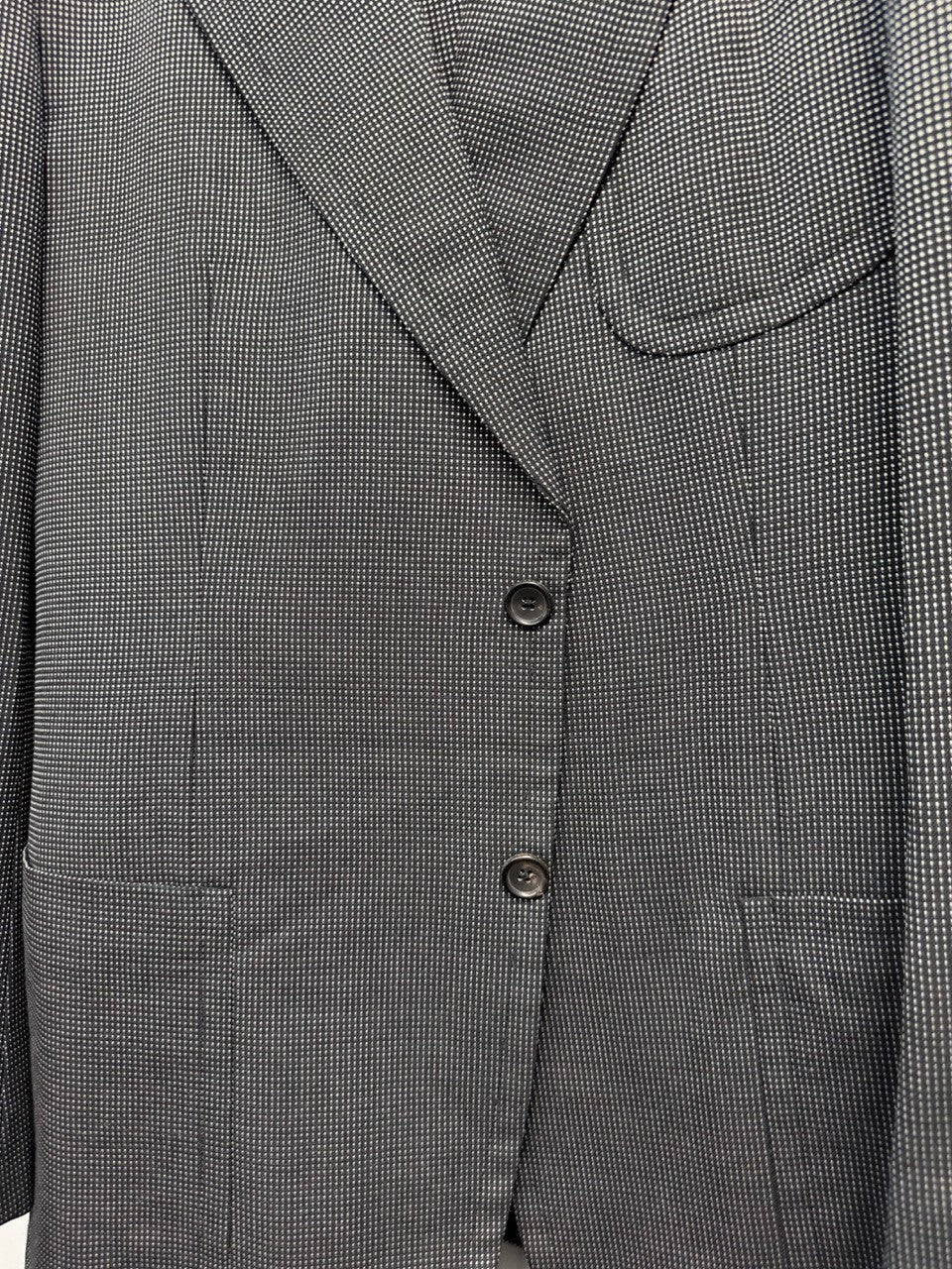 BERLIN VINTAGE CORNER grey micro-dot wool blend suit jacket with notched lapel and two-button closure.