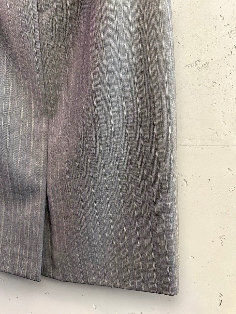 BERLIN VINTAGE CORNER Escada Margaretha Ley grey pinstripe wool skirt with a back vent detail.