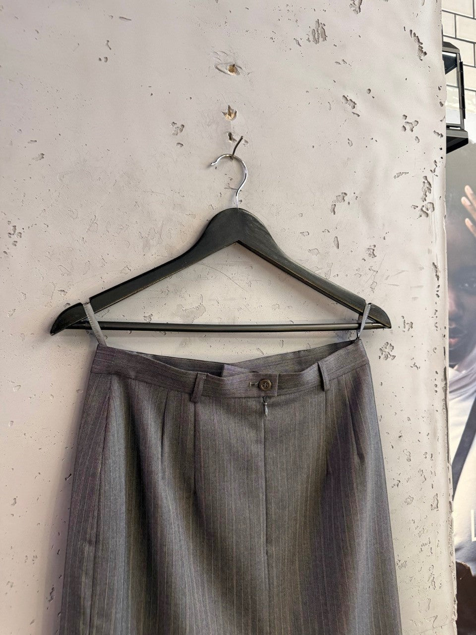 BERLIN VINTAGE CORNER Escada Margaretha Ley grey pinstripe wool skirt with button closure on a black hanger
