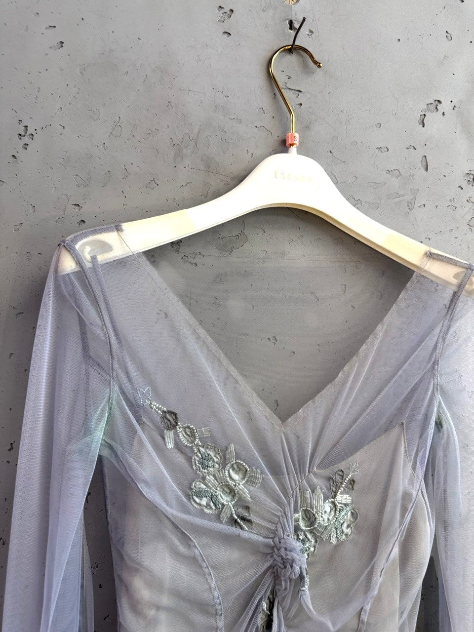 BERLIN VINTAGE CORNER grey sheer tulle long sleeve blouse with intricate floral beadwork and a flattering V-neckline