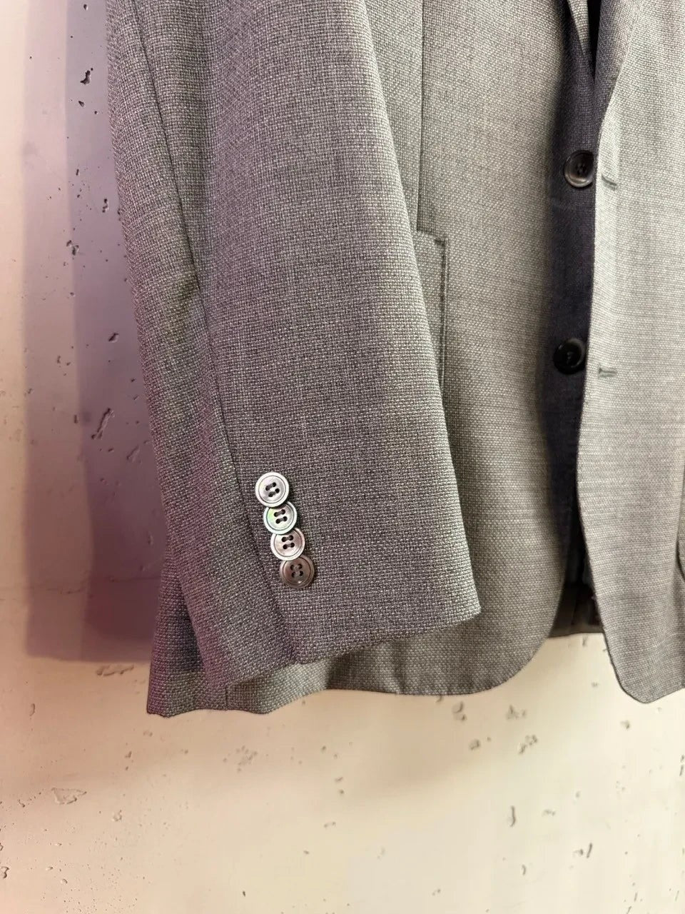 BERLIN VINTAGE CORNER grey wool blend suit jacket with four button cuffs and two button closure.