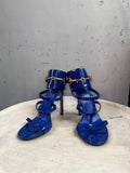 BERLIN VINTAGE CORNER blue patent leather Gucci high-heel sandals with gold horsebit hardware and ankle cuffs.