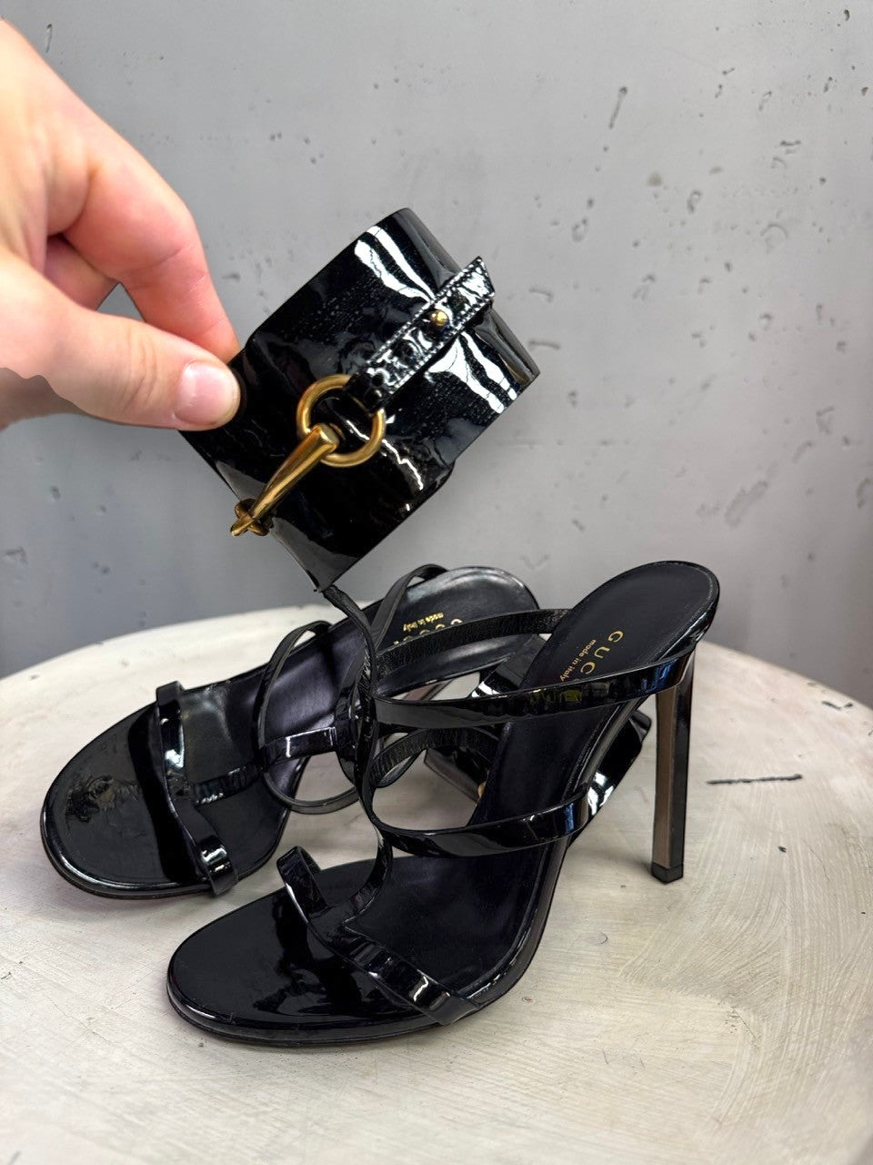 BERLIN VINTAGE CORNER black patent leather Gucci high heel sandals with gold horsebit ankle cuff detail