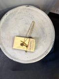 BERLIN VINTAGE CORNER gold-tone helicopter pendant necklace with Louis Vuitton pouch. Detailed charm and delicate chain.