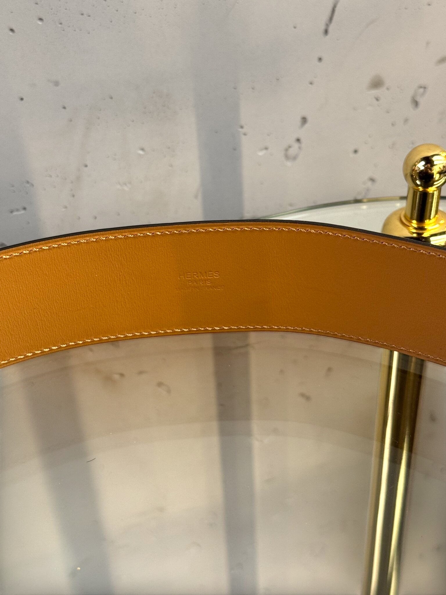 BERLIN VINTAGE CORNER Hermes leather belt interior with tan lining and embossed logo detail