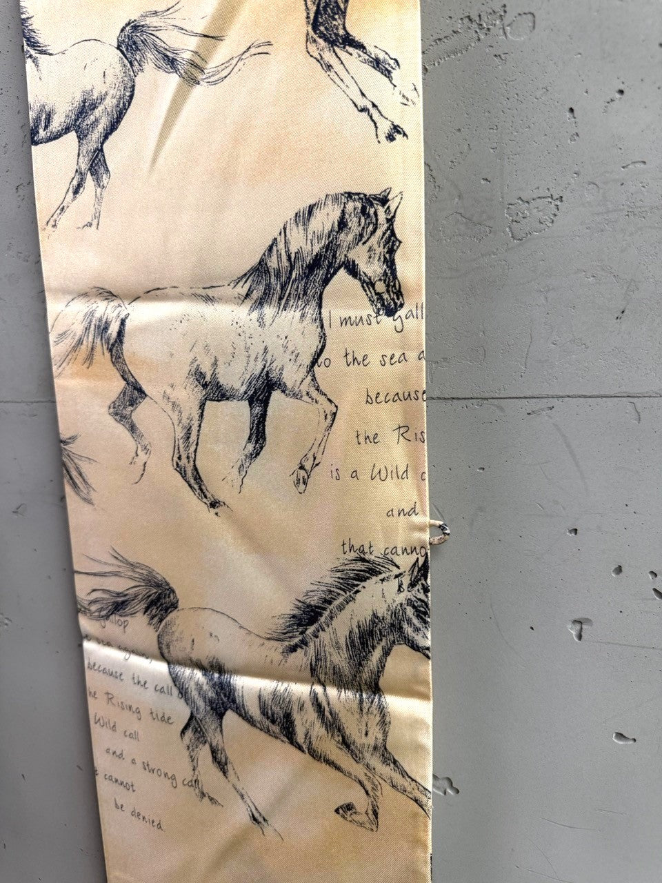 BERLIN VINTAGE CORNER skinny silk scarf in golden-tan with charcoal sketch horse print and poetic script text.