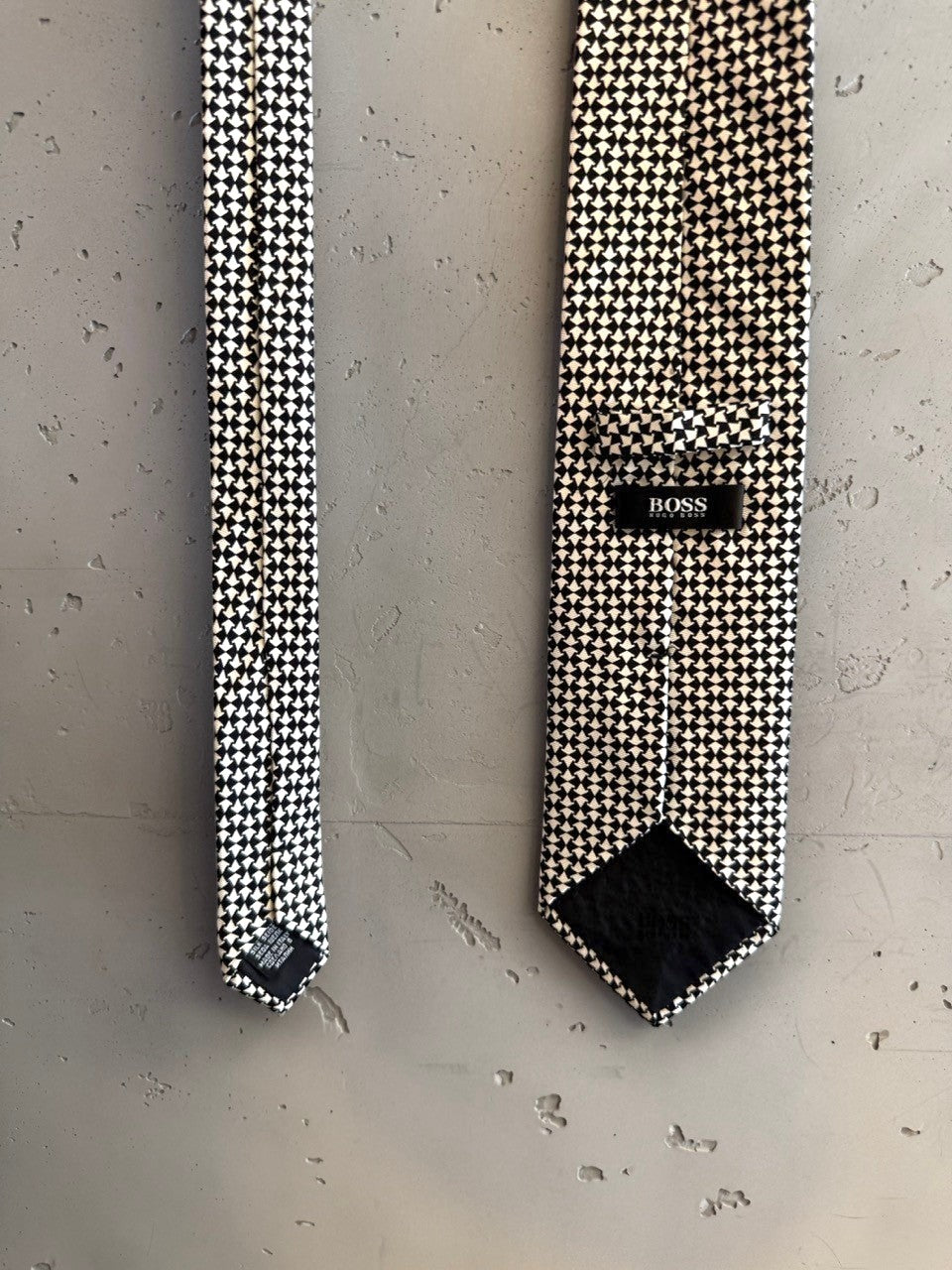 BERLIN VINTAGE CORNER black and white houndstooth pattern necktie. Sophisticated formal wear accessory.