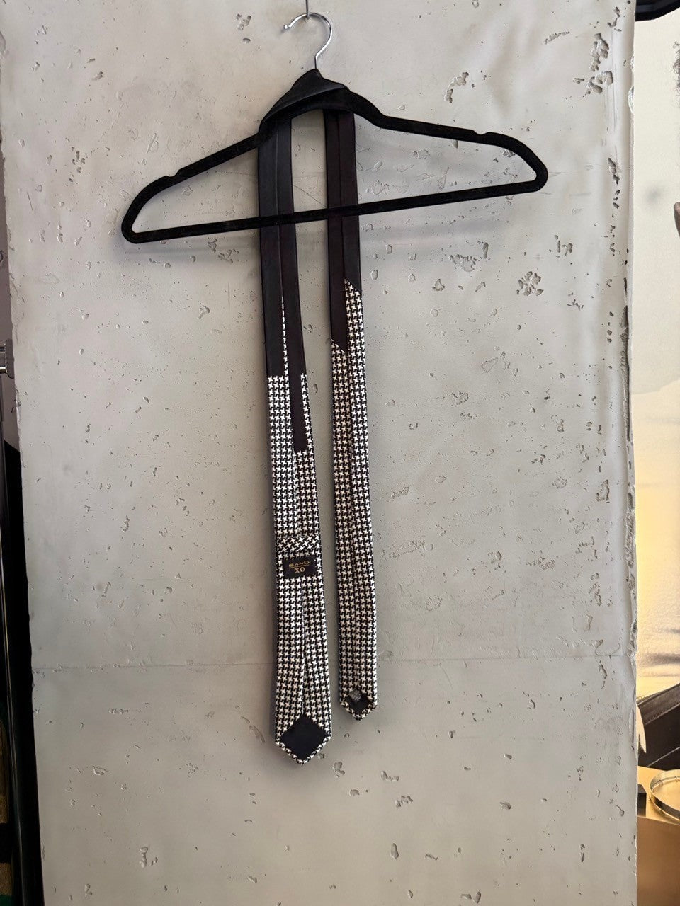BERLIN VINTAGE CORNER black and white houndstooth pattern necktie with a solid black panel and subtle texture.