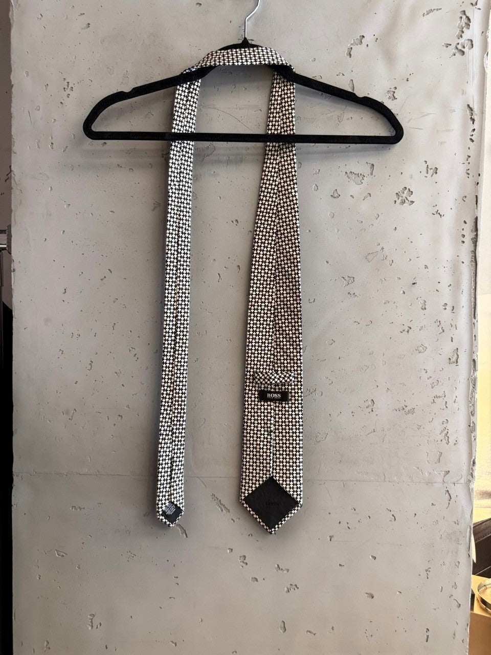 BERLIN VINTAGE CORNER black and white micro-dot patterned necktie, classic formal wear accessory.