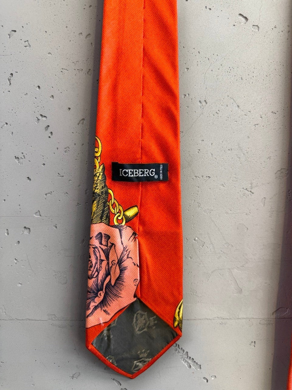 BERLIN VINTAGE CORNER ICEBERG orange designer necktie with whimsical crocodile, gold chain, and floral graphic print