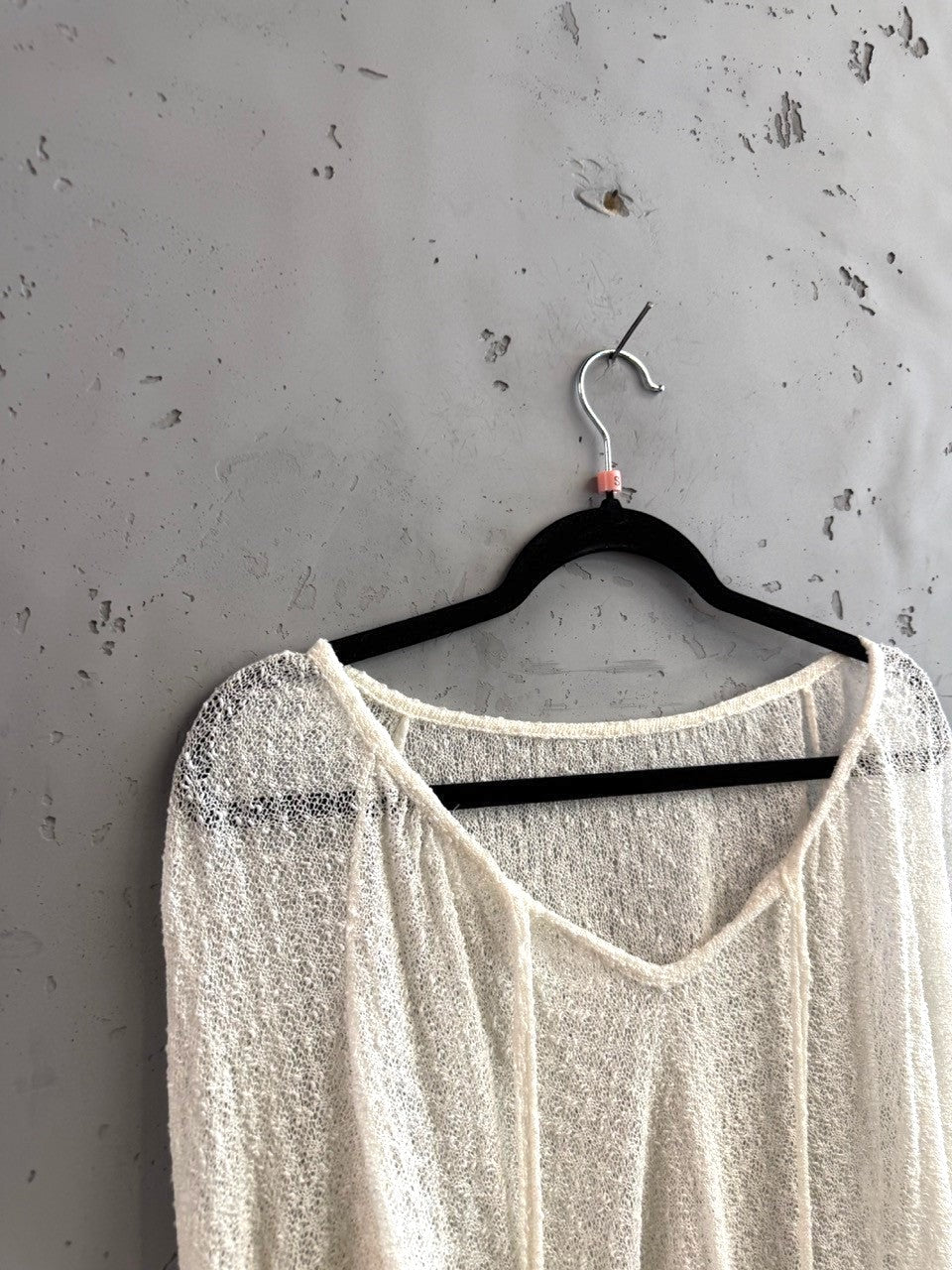 BERLIN VINTAGE CORNER ivory sheer long sleeve V-neck pullover sweater with drawstring detail