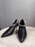 BERLIN VINTAGE CORNER Jil Sander black leather pointed-toe pumps with sculptural translucent ankle rings and stiletto heels.