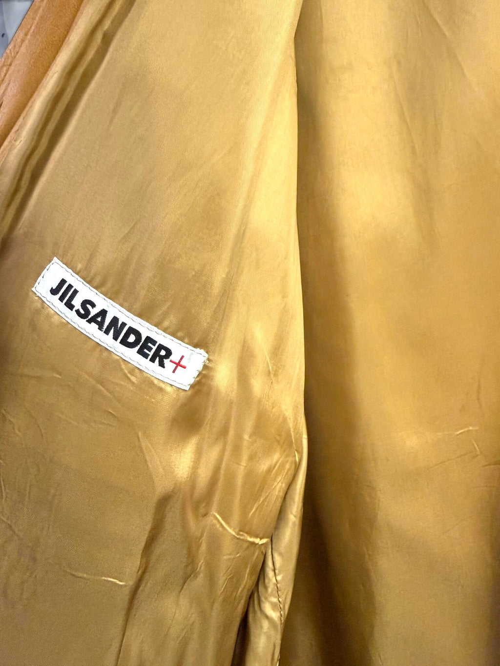 BERLIN VINTAGE CORNER Jil Sander+ leather jacket interior lining with white brand label on tan fabric