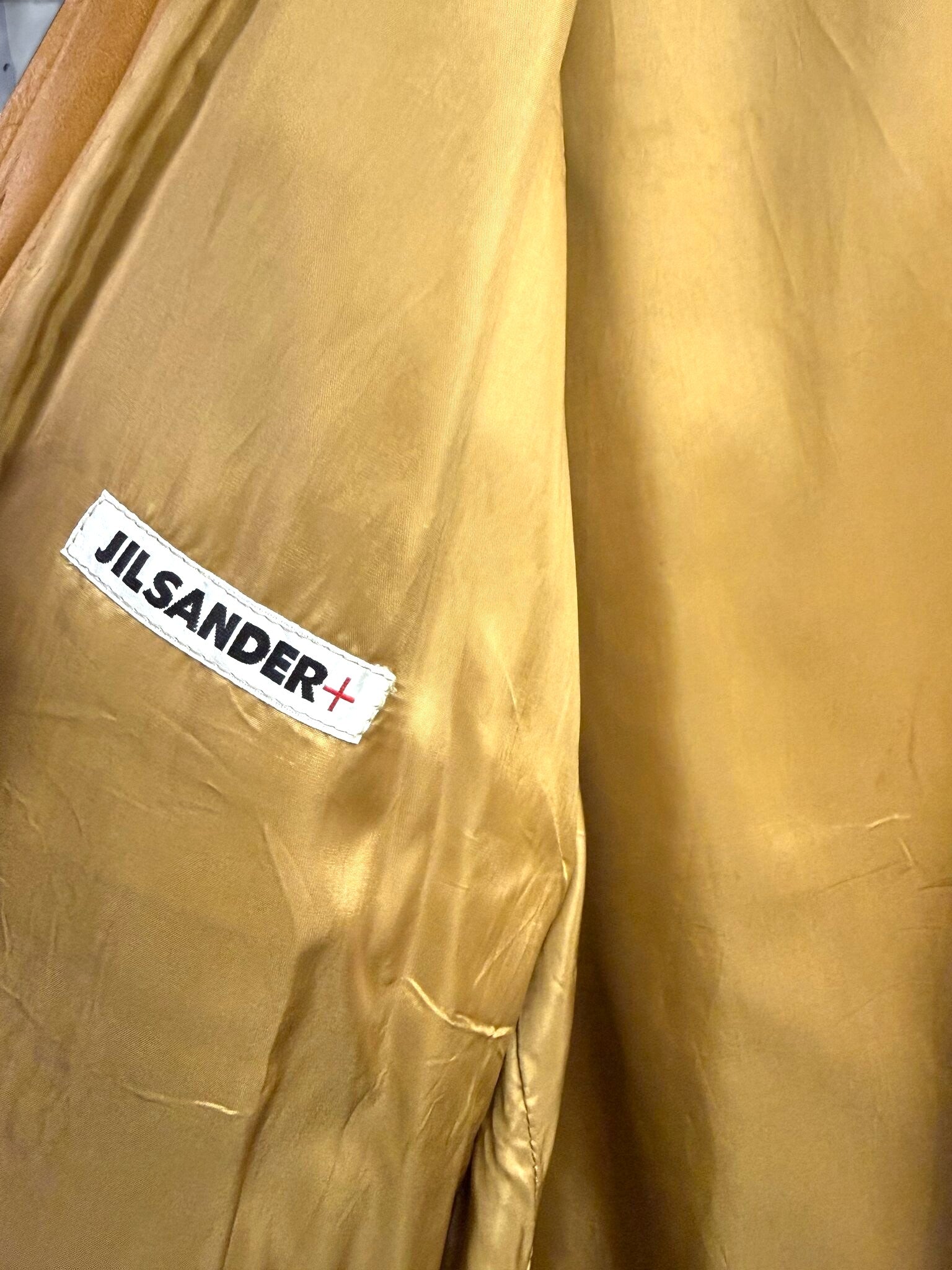 BERLIN VINTAGE CORNER Jil Sander+ leather jacket interior lining with white brand label on tan fabric