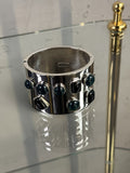BERLIN VINTAGE CORNER Jil Sander wide silver-tone hinged cuff bracelet with dark jewel-toned stone accents.