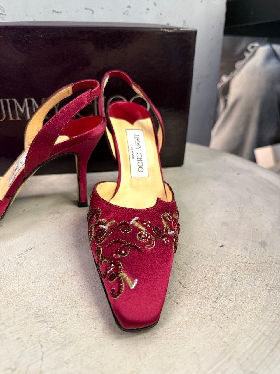 BERLIN VINTAGE CORNER Jimmy Choo burgundy satin slingback heels with intricate beadwork and pointed toe.