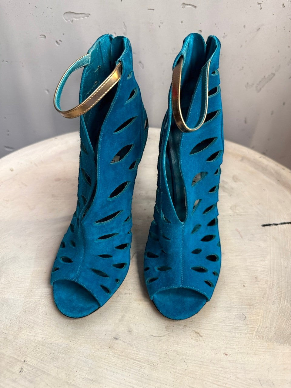 BERLIN VINTAGE CORNER Jimmy Choo teal blue suede peep-toe booties with laser-cut details and metallic gold ankle straps.