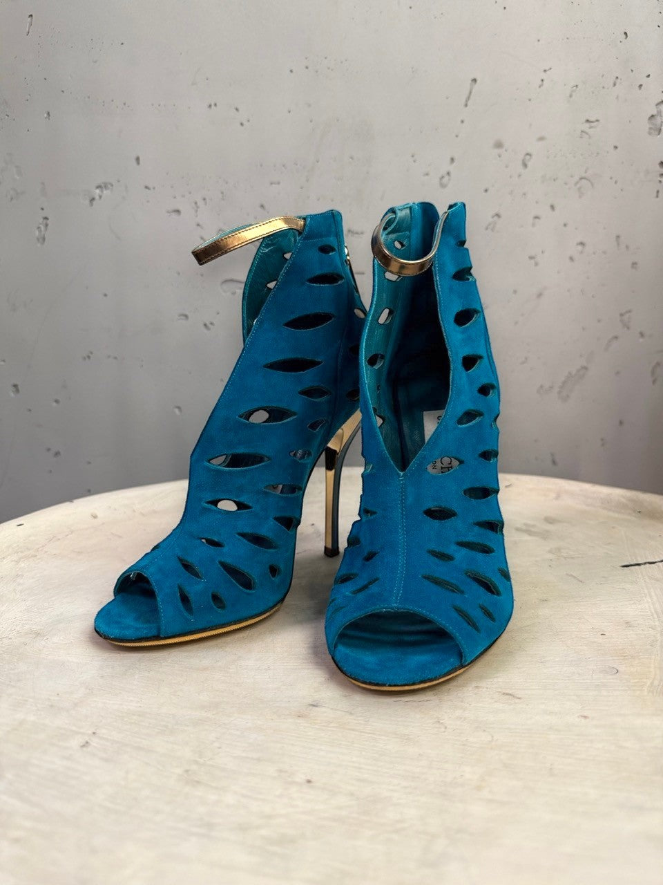 BERLIN VINTAGE CORNER Jimmy Choo teal suede peep-toe booties with laser-cut details and metallic gold stiletto heels.