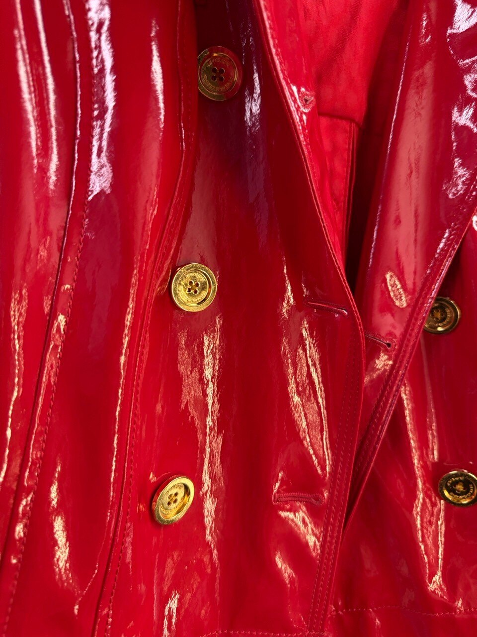 Juicy Couture coat, gold double breasted buttons in close up