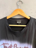 BERLIN VINTAGE CORNER Just Cavalli black cotton crewneck t-shirt with script logo and spray paint effect detail