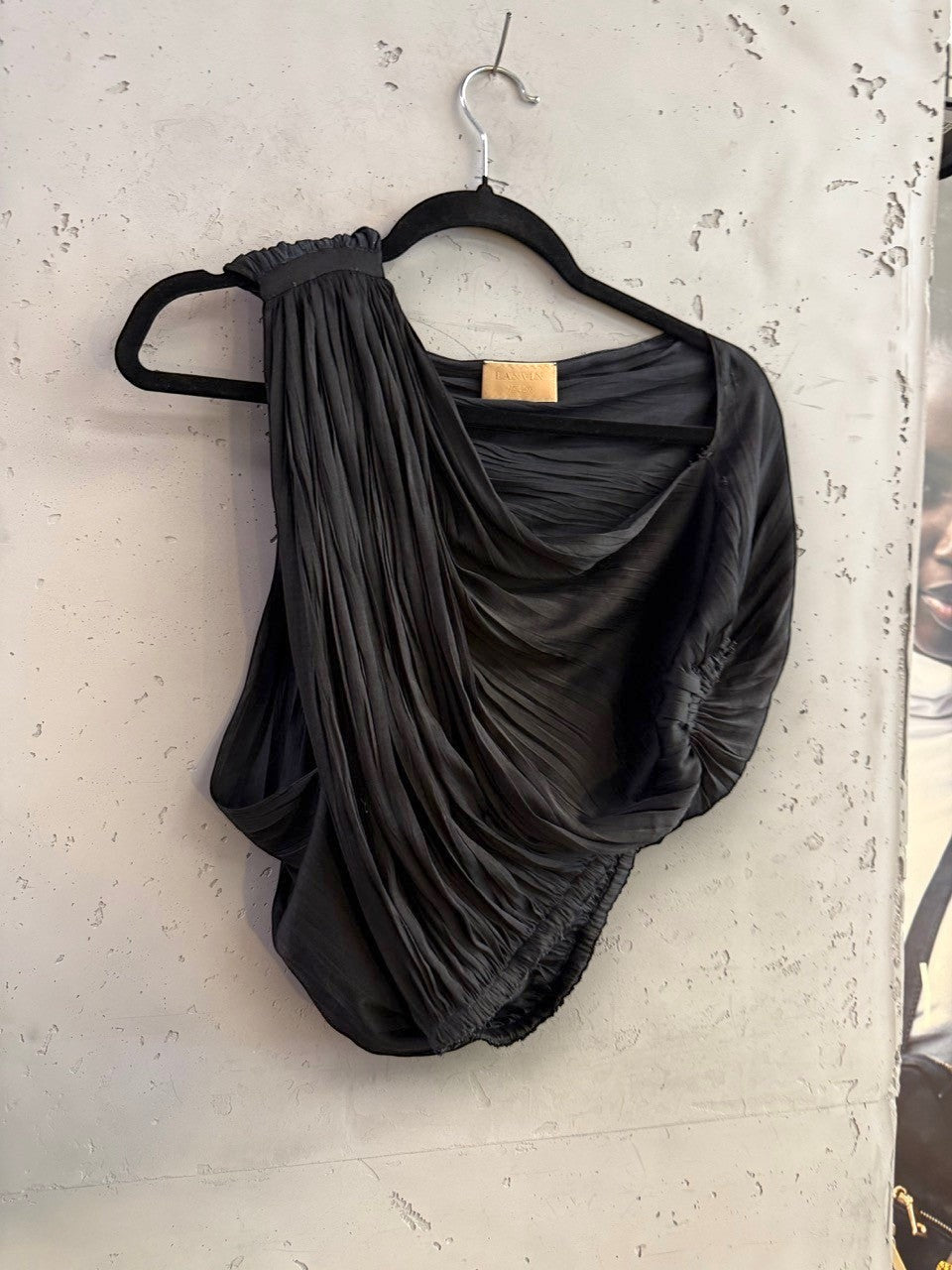 BERLIN VINTAGE CORNER black Lanvin one-shoulder top with micro-pleated texture and architectural draping.