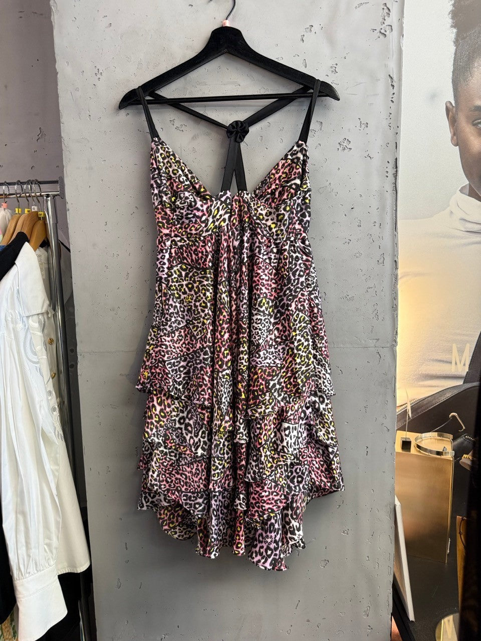 BERLIN VINTAGE CORNER pink, purple, yellow leopard print tiered mini dress with spaghetti straps and gathered bust.