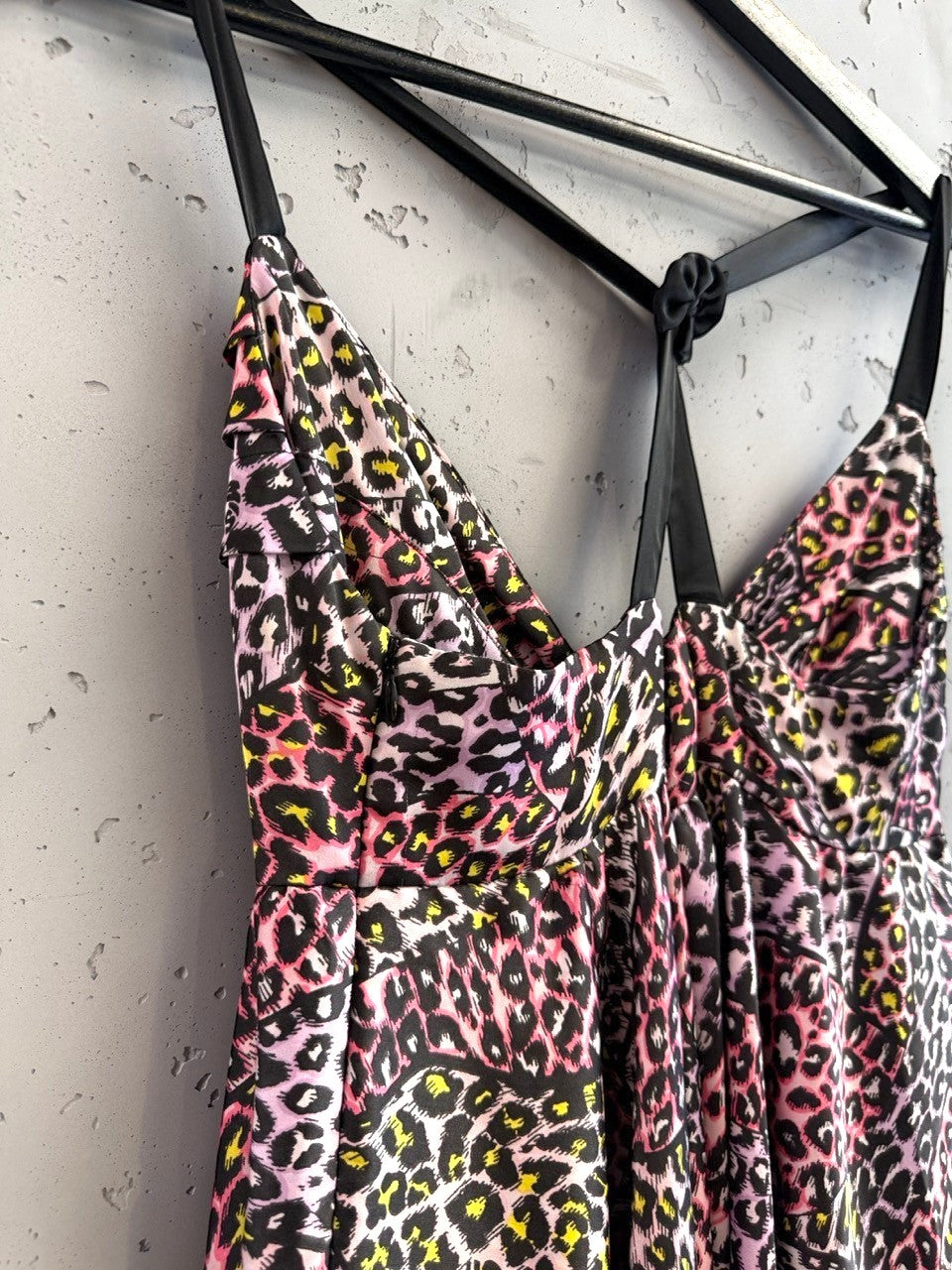 BERLIN VINTAGE CORNER pink, purple, yellow, black leopard print tiered mini dress with spaghetti straps and gathered bust.