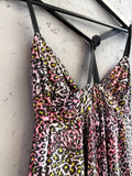 BERLIN VINTAGE CORNER pink, purple, yellow, black leopard print tiered mini dress with spaghetti straps and gathered bust.