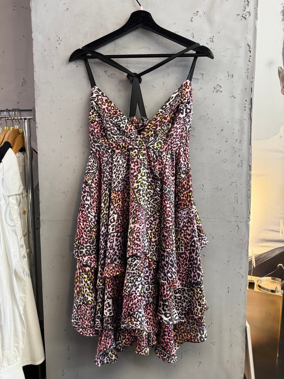 BERLIN VINTAGE CORNER pink, purple, yellow leopard print tiered mini dress with spaghetti straps and gathered bust.