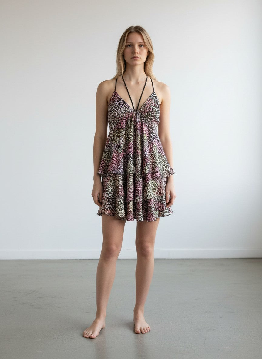 BERLIN VINTAGE CORNER pink, purple, yellow, black leopard print tiered mini dress with spaghetti straps and ruffled hem.
