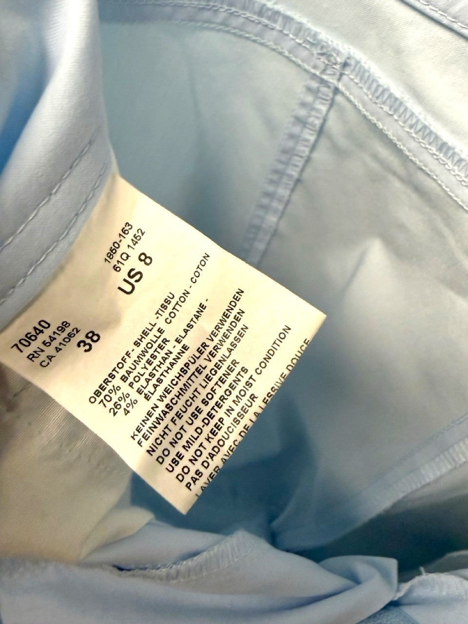 BERLIN VINTAGE CORNER light blue cropped trousers with mid-rise waist and subtle stitching details.